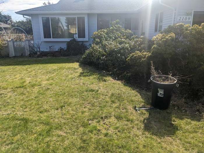 mowing  lawn with sprinklers running