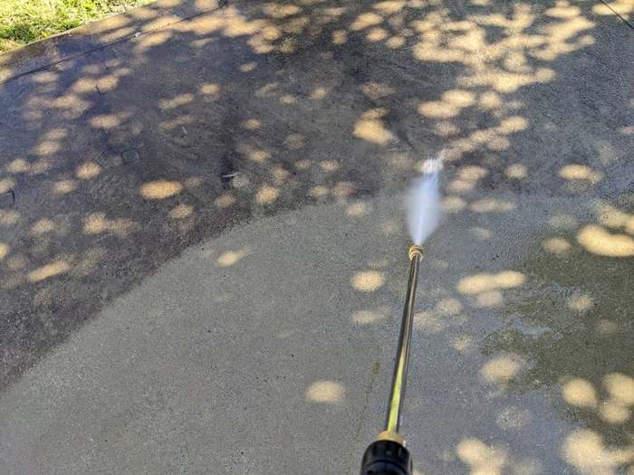 cleanup  pressure washer concrete